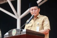 Sekda Batam, Firmansyah, menyampaikan sambutan saat memperingati HUT ke-27 BMGQ Kota Batam di Dataran Engku Putri, Batamcentre, Senin (6/7/2026). HUMAS DISKOMINFO BATAM