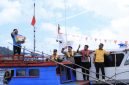 Polres Kepulauan Anambas Salurkan Bendera Merah Putih dan Bansos untuk Nelayan (dok/photo)